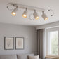 Moderne witte plafondlamp met draaibare en kantelbare lichtpunten, energiebesparend ontwerp